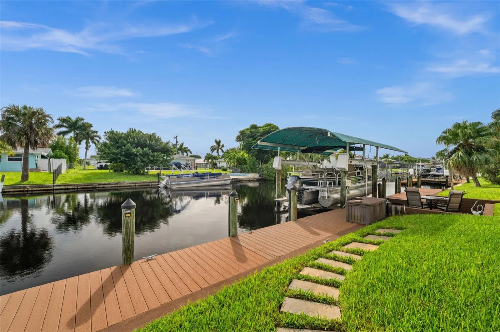 Captain's walk, dock and covered boat lift