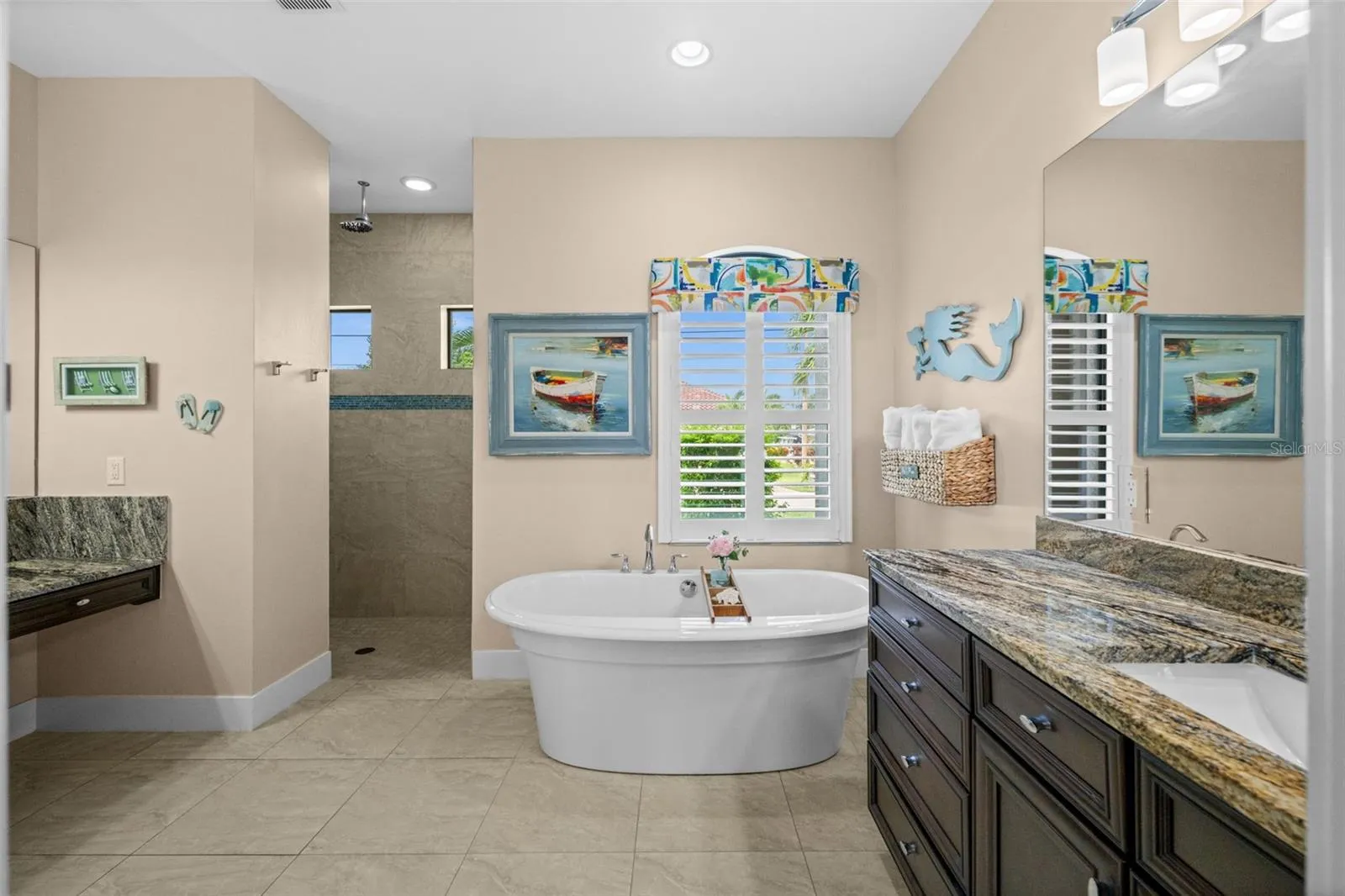 Primary bath with walk in shower tub and dual sinks