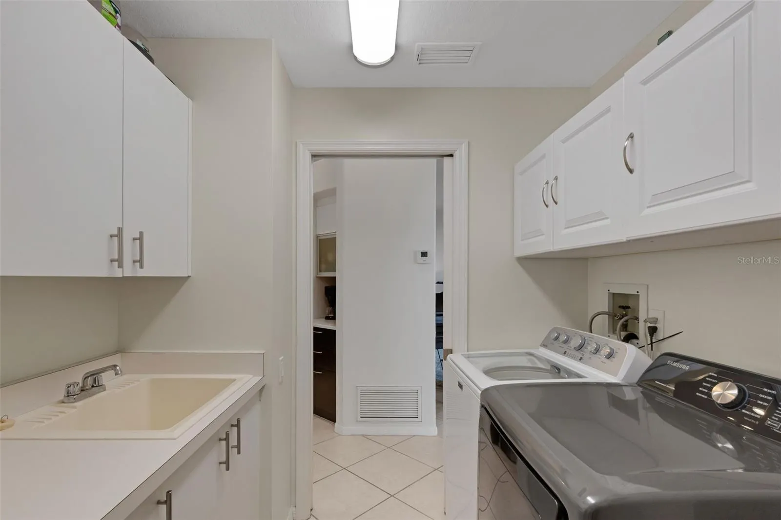 Laundry room with sink and countertop