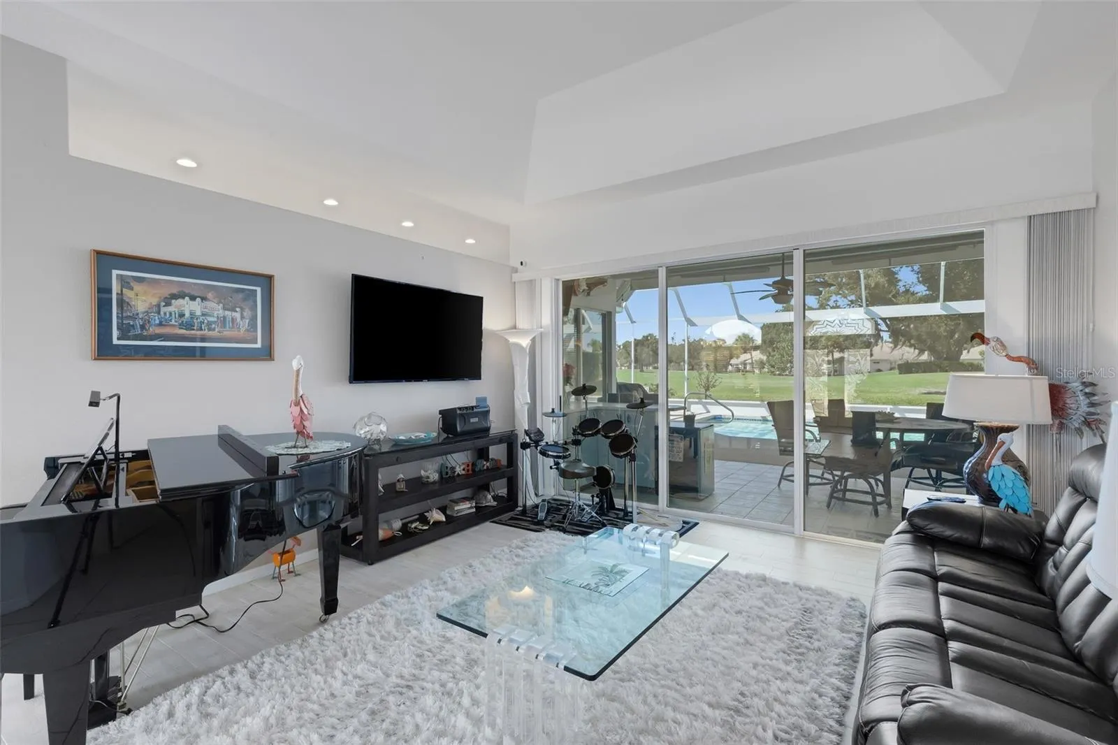View out to pool and golf course