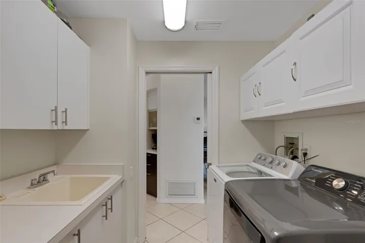 Laundry room with sink and countertop