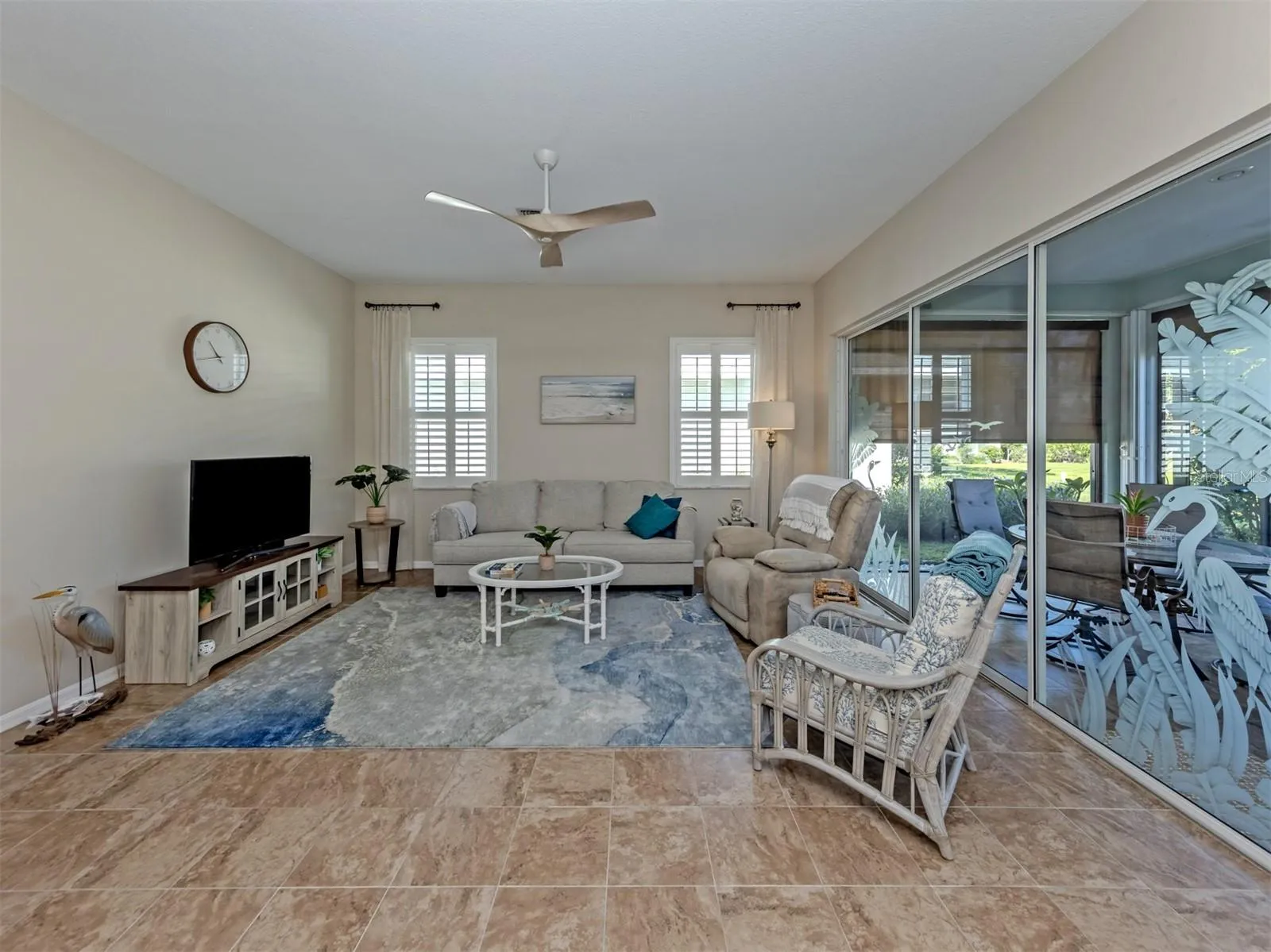 Another lovely perspective of this bright and airy living space, where comfort, elegance, and an effortless flow create the perfect setting for everyday living and entertaining!