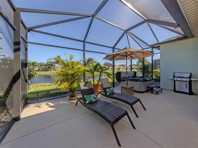 This is what Florida living is all about! Imagine leisurely mornings, breezy afternoons, and picture-perfect evenings on your gorgeous extended lanai, where the shimmering lake creates a breathtaking backdrop! Spacious, screened, and surrounded by natural beauty, it's an irresistible spot to kick back, entertain, and savor every beautiful moment!