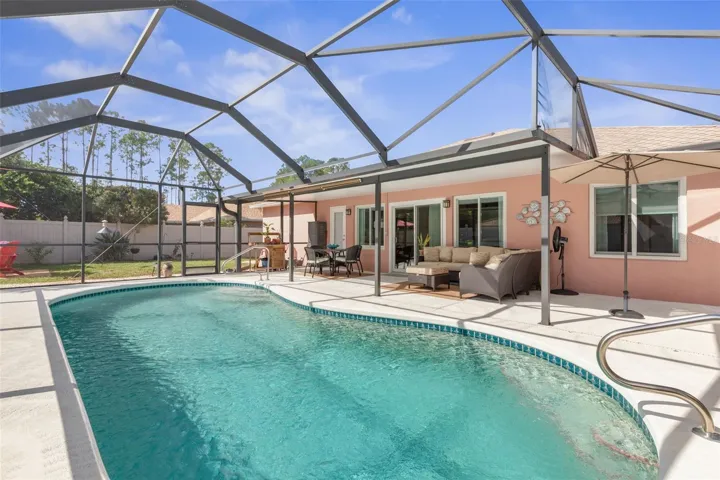 Your own private slice of paradise! Spend sun-filled afternoons floating in the sparkling pool, then unwind in the shade of the screened lanai, where lounging and poolside dining make every day feel like a vacation.