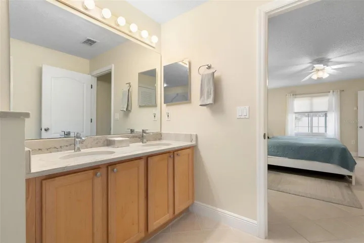 Two sinks, one happy couple! The primary ensuite's spacious dual vanity gives everyone their own space to get ready, making busy mornings a little easier and sharing a bathroom a lot more enjoyable!