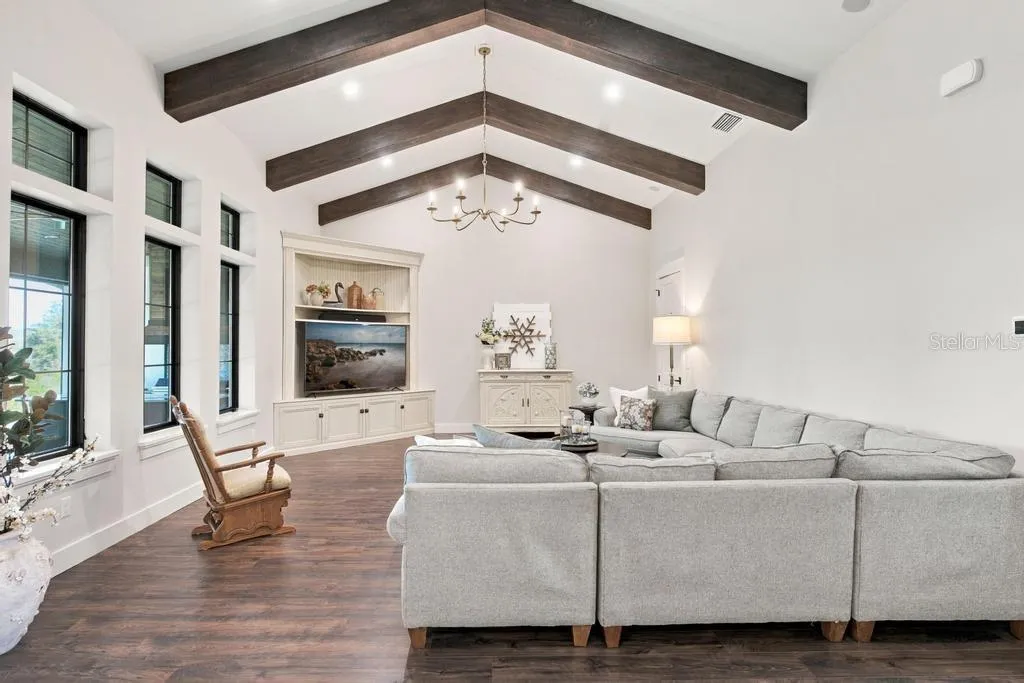 Great room with wood beamed ceilings