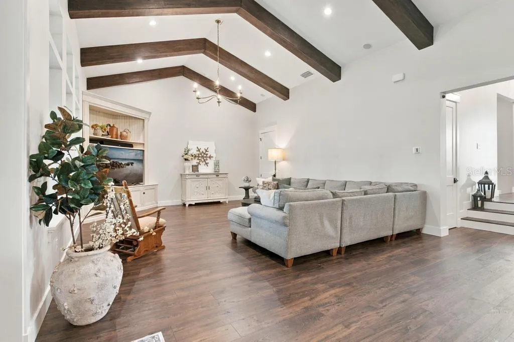 Cathedral Ceilings with the wood beams.