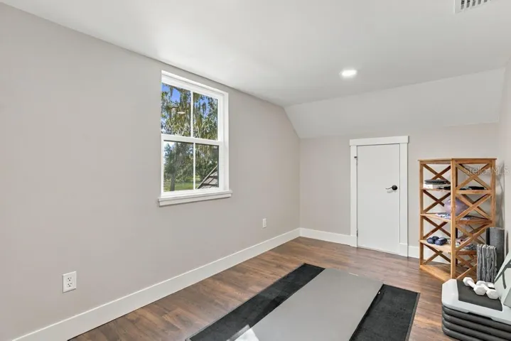 Upstairs flex or play space... great fitness room with closet!