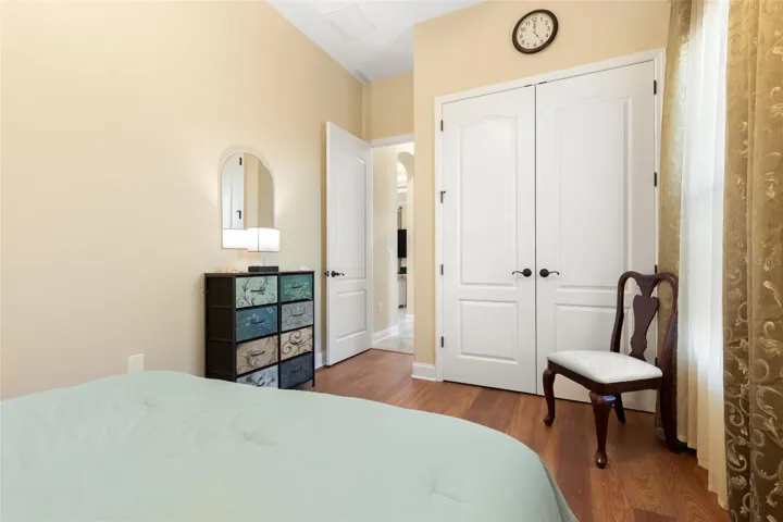 Another perspective of First-Floor Bedroom #2, highlighting its closet space and convenient location within the home.