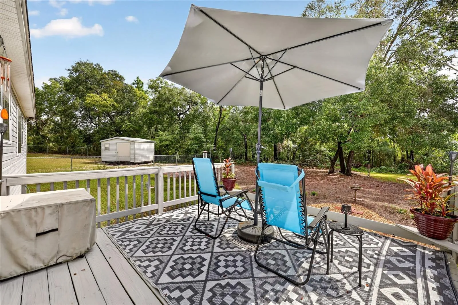 Outdoor deck overlooking the backyard