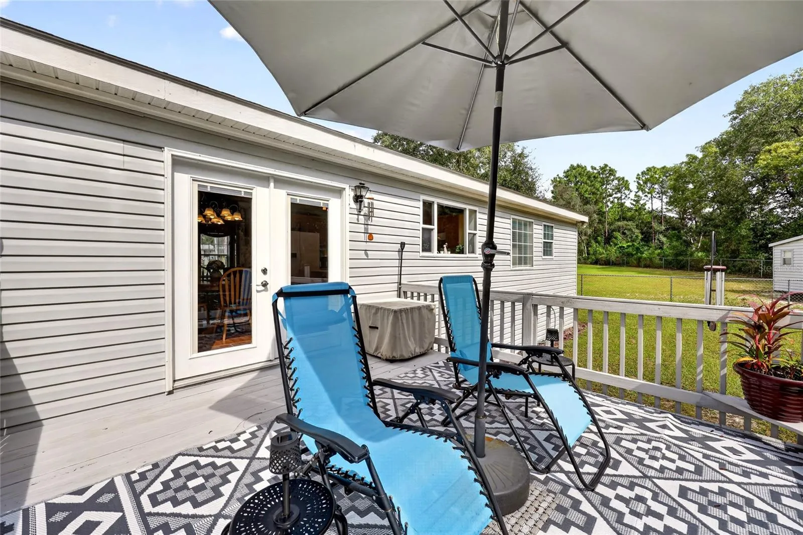 Outdoor deck overlooking the backyard