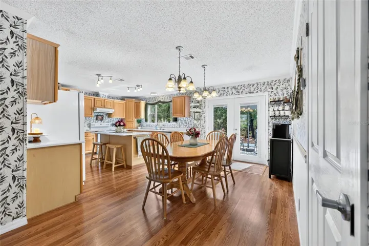 Dining room with french doors to sundeck