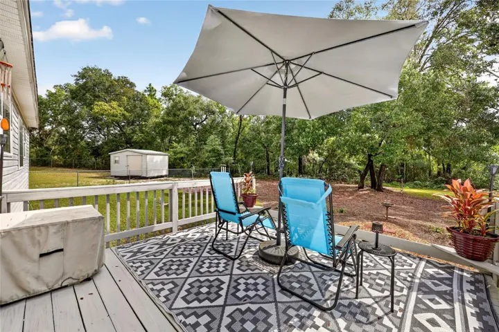 Outdoor deck overlooking the backyard