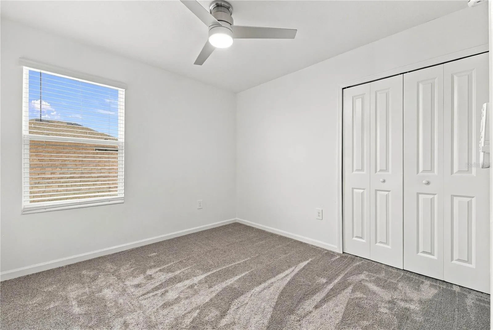 Bedroom with Double-Door Closet