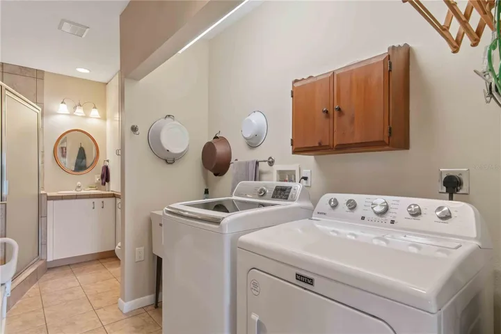 Primary bathroom / washer &amp; dryer