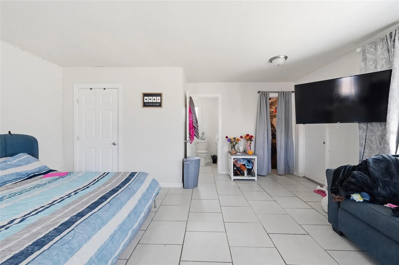 Primary bedroom 2420 with 1/2 bath and laundry