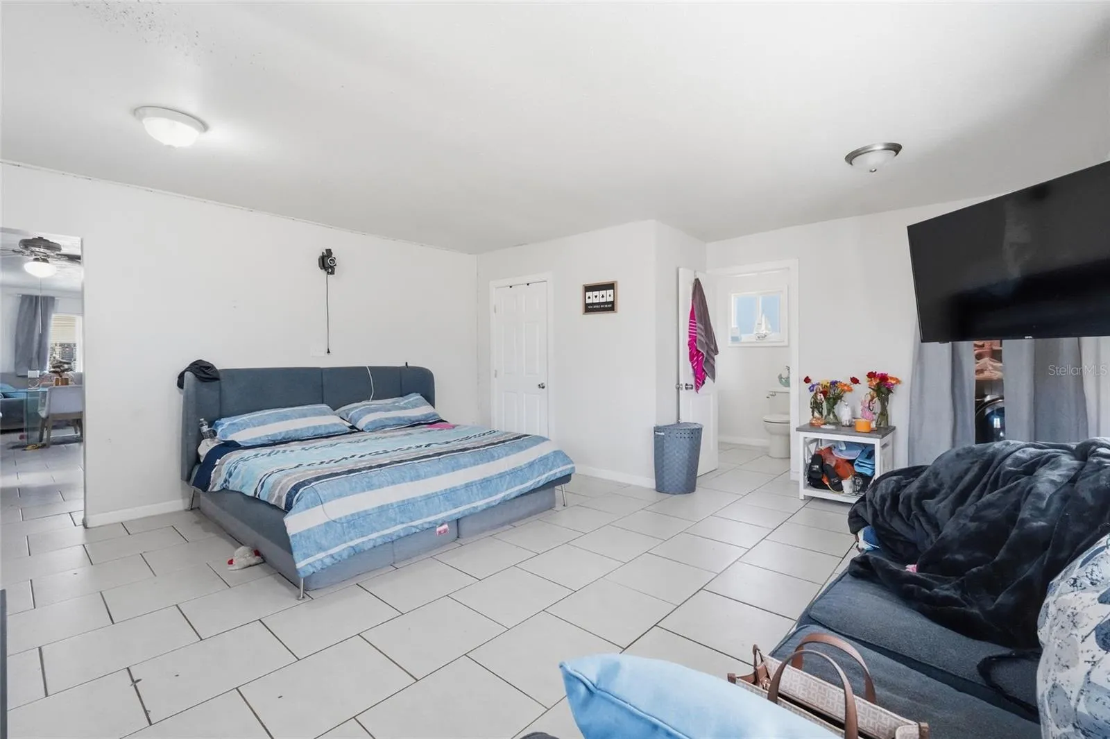 Primary bedroom 2420 with 1/2 bath and laundry
