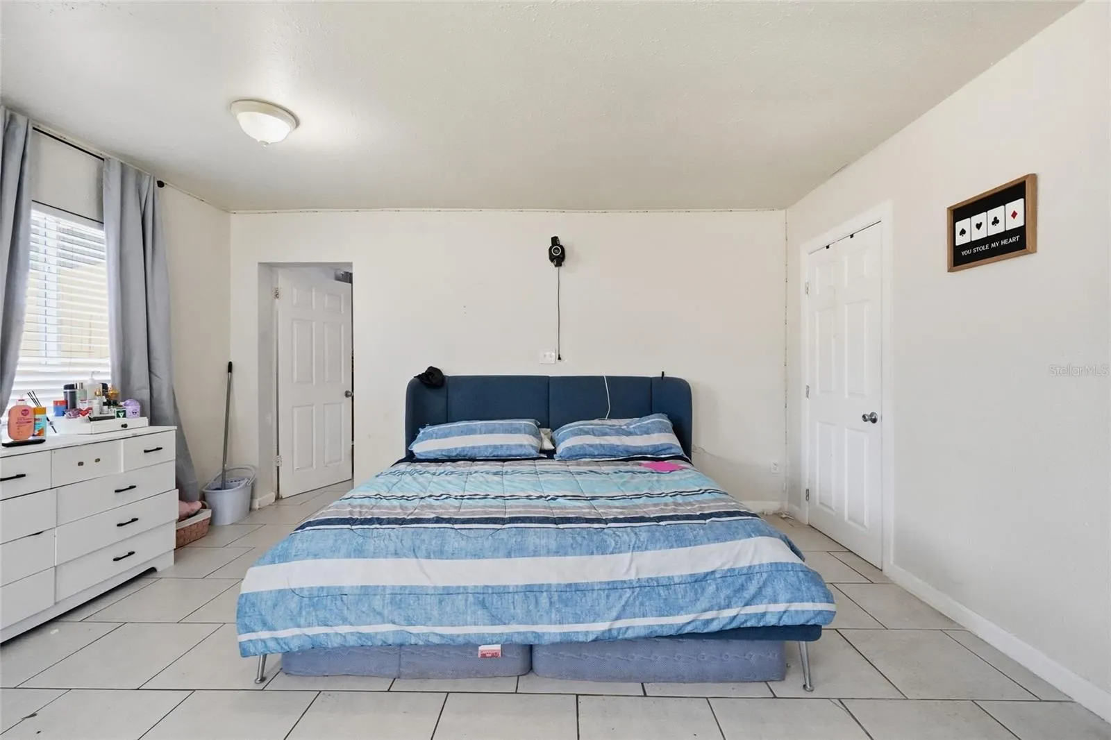 Primary bedroom 2420 with 1/2 bath and laundry