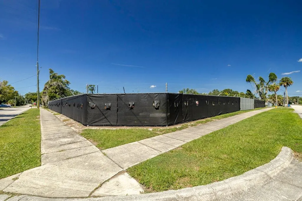 Corner of vacant lot at Voorhis and Dexter