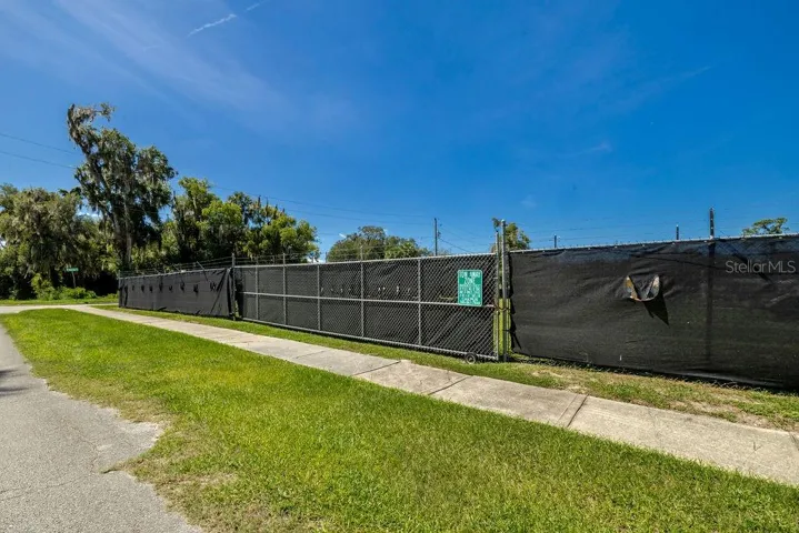 Vacant lot access facing Dexter.
