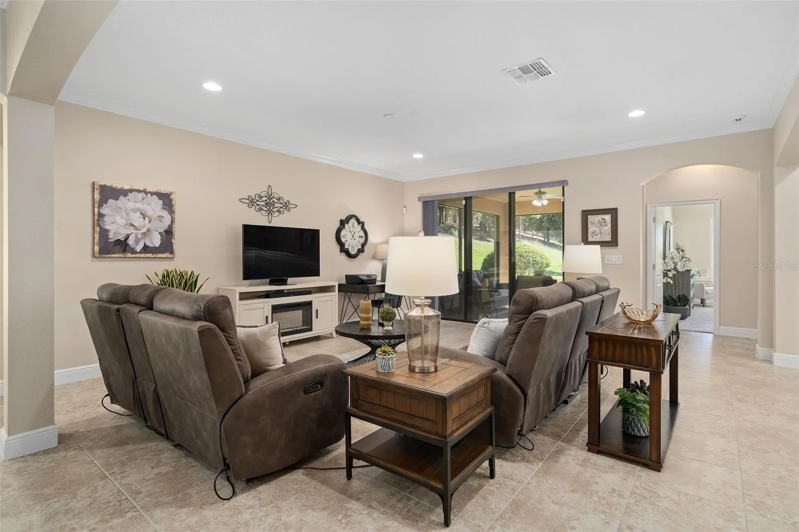 Family Room with direct access to the Screened Lanai and a great backyard.