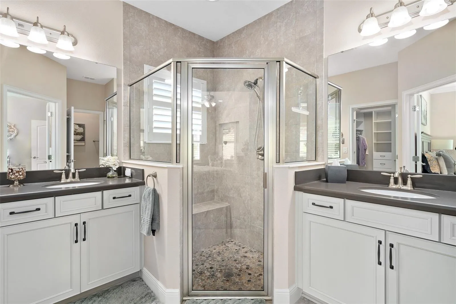 Primary En-Suite with Comfort Height split vanities.