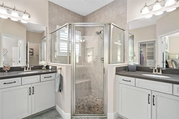 Primary En-Suite with Comfort Height split vanities.