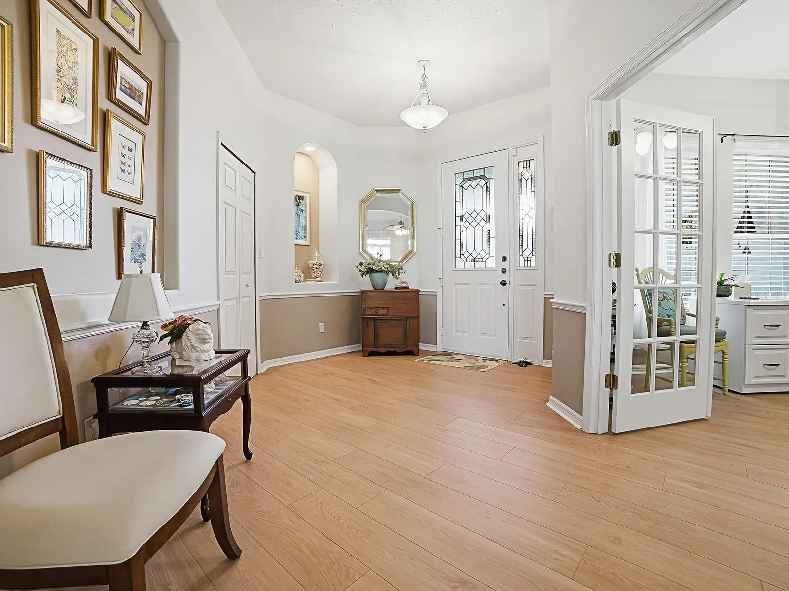 Spacious Foyer with a Hall Closet. This home has 8 closets and a walk in Pantry
