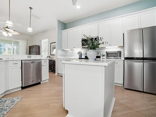 Lots of light and cabinets in this beautiful kitchen