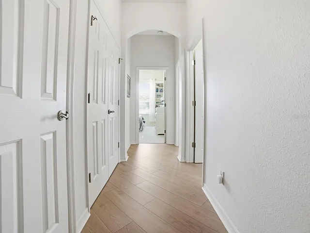 Hallway to the 2 Guest Rooms PLUS a double closet and Another Closet