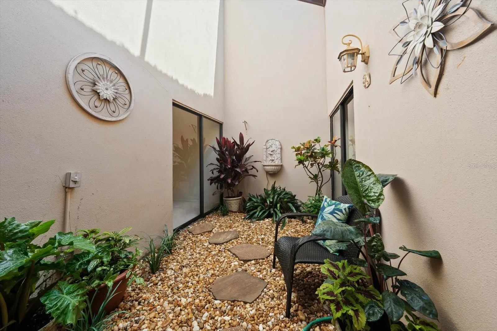Screened in Atrium between Bedroom #2 and #3
