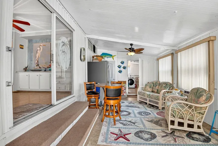 Enclosed living area to the westside of home