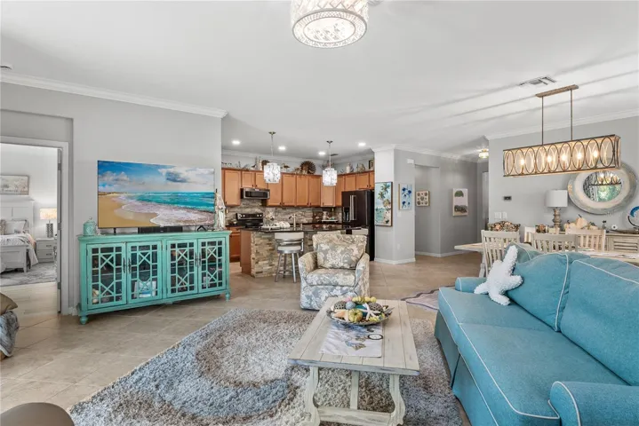 Facing into home with dining and kitchen behind