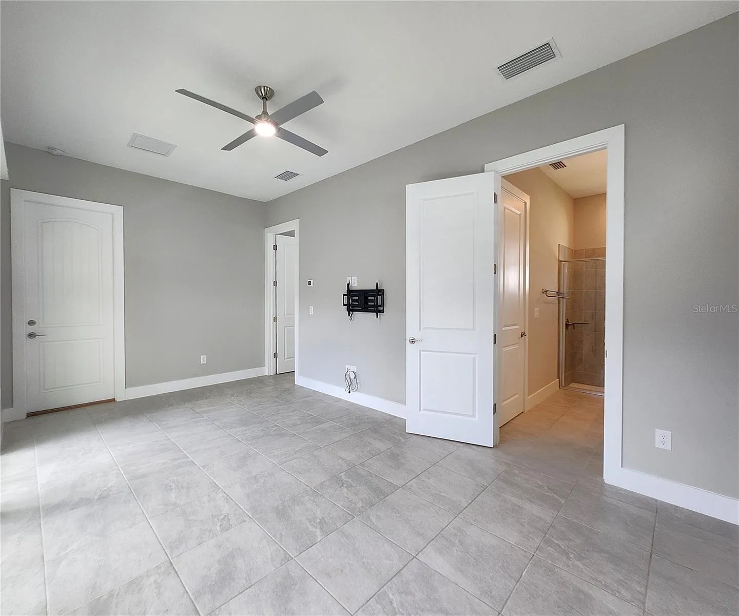 Guest House measures approximately 20x23, includes 1 bedroom, 1 full bathroom, living room, impact glass sliders with remote controlled shades.