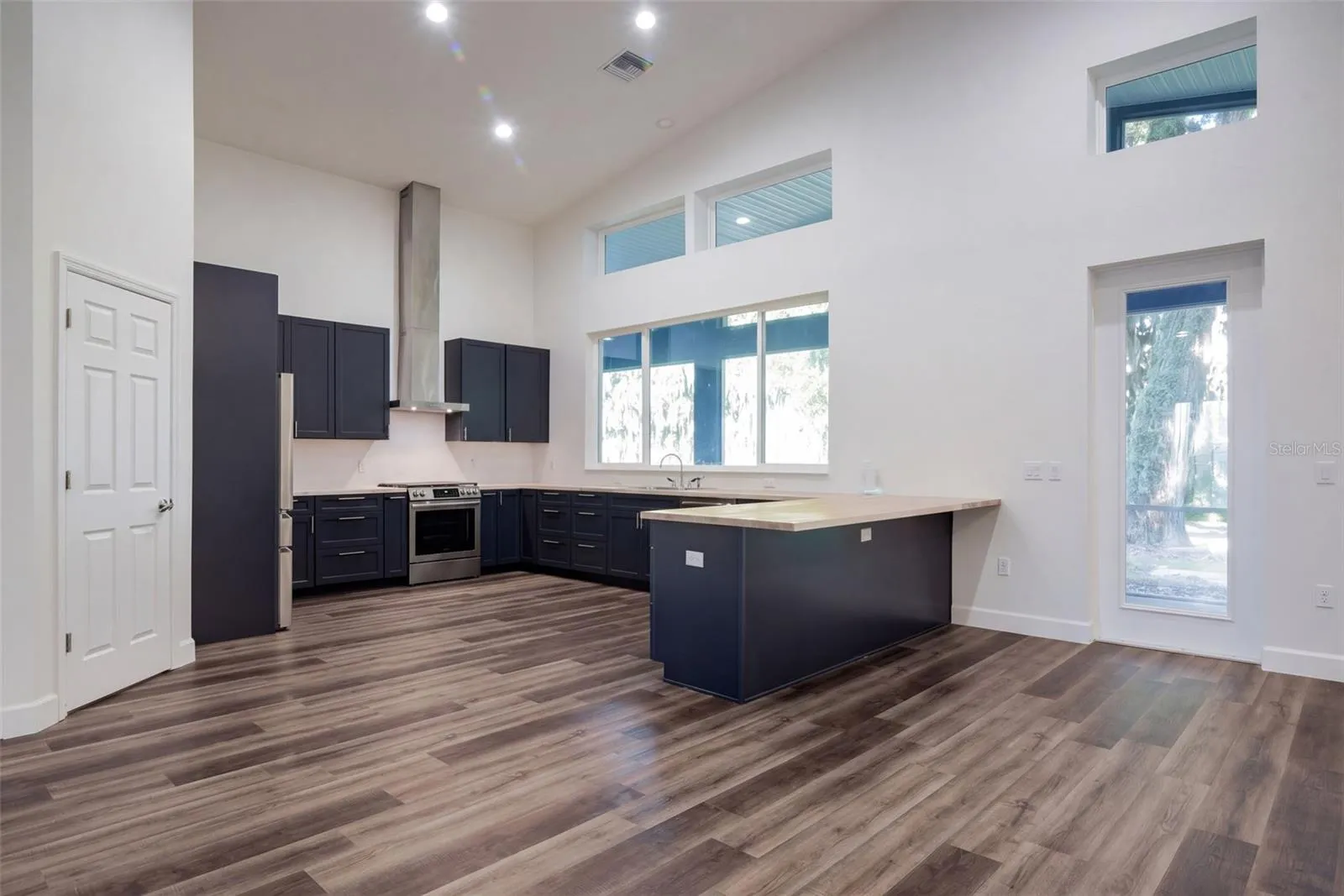 Kitchen with clerestory windows and direct access to the porch