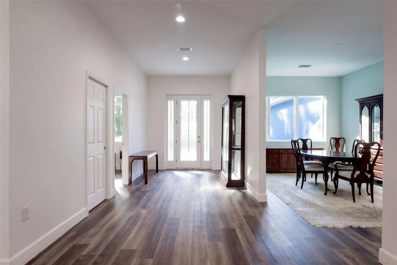 Bright foyer opens to the dining room
