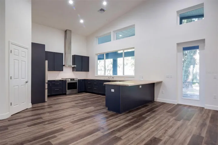 Kitchen with clerestory windows and direct access to the porch