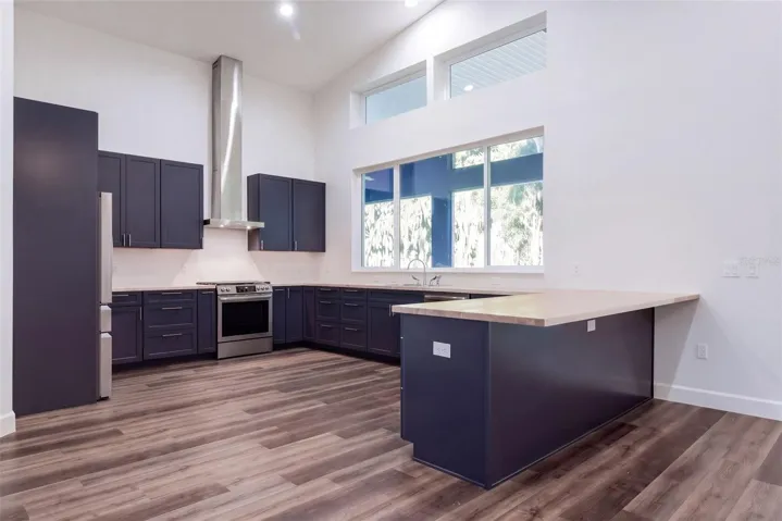 Kitchen designed for cooking and gathering, open to the great room