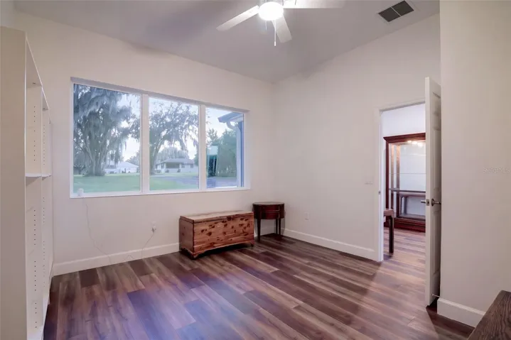 14x13 office with ceiling fan, ideal for working from home