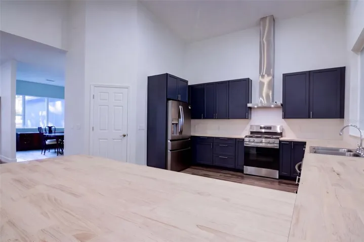 Butcher block breakfast bar with seating for casual meals
