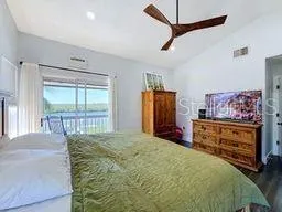 Primary Bedroom With View Of River