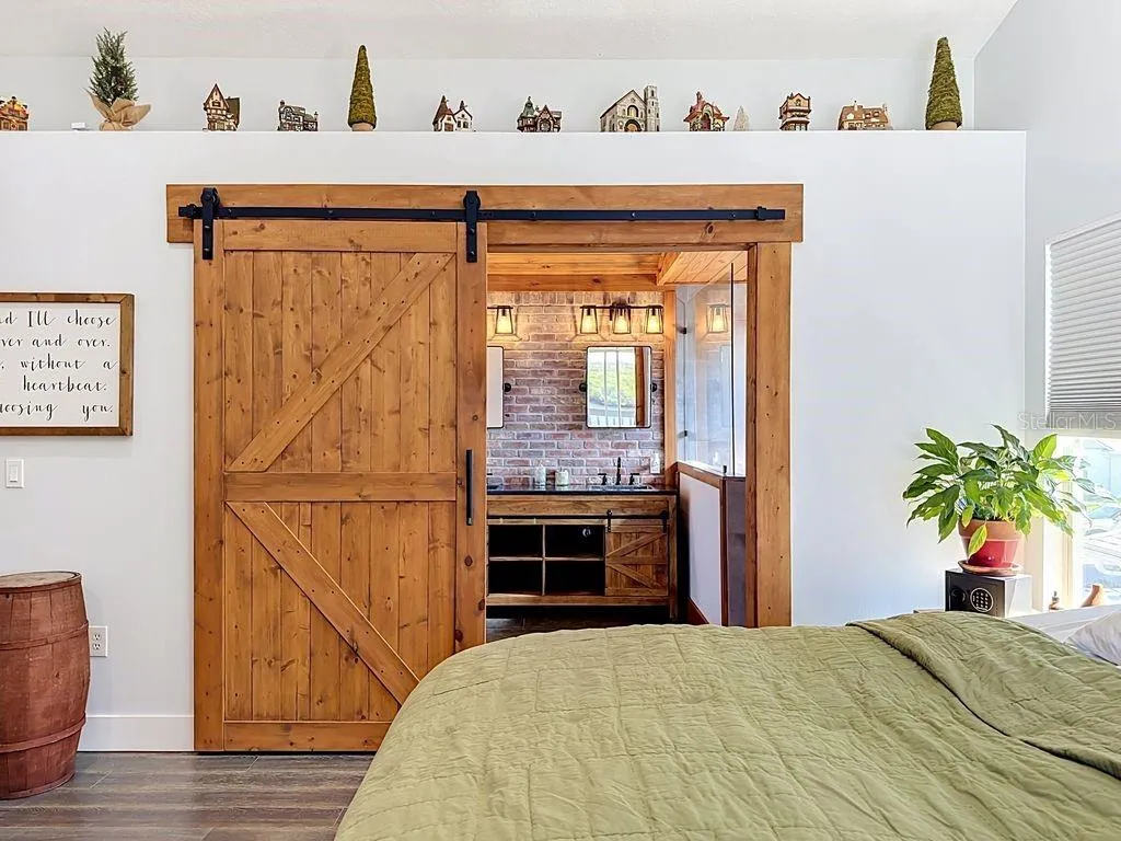 Barn Door and Brick Accent Wall