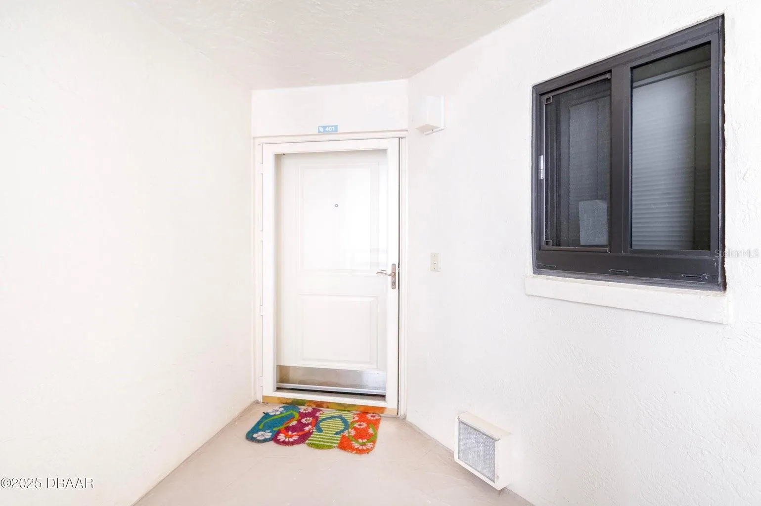 This unit offers privacy with a quiet entry and welcoming coastal touches.