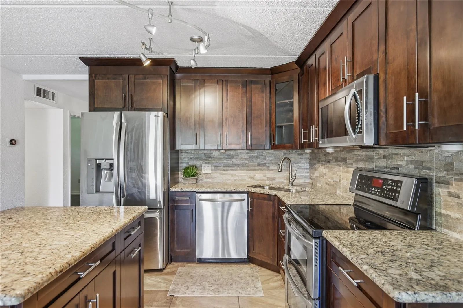 Kitchen, stainless steel appliances, wood cabinets, Granite countertops