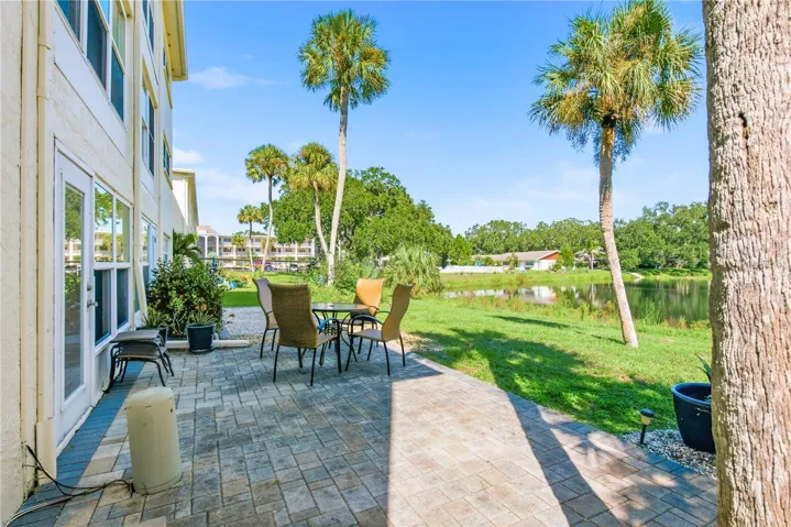 Oversized patio with pond views