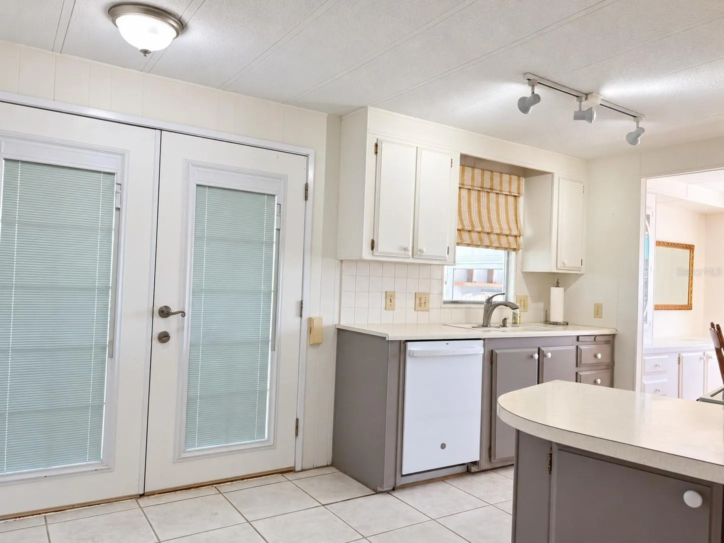 Kitchen with French entry doors