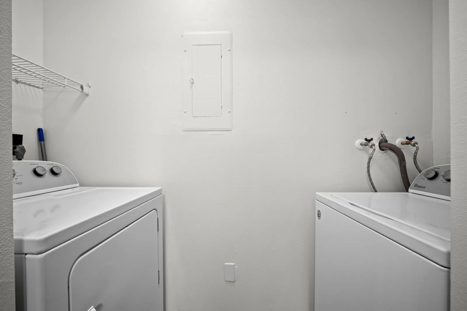 in door laundry area in the kitchen