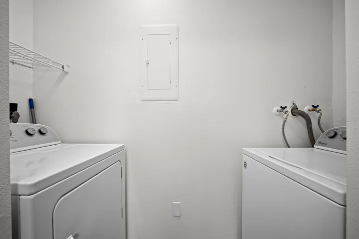 in door laundry area in the kitchen