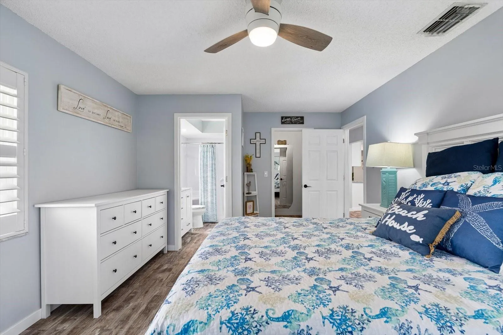 Primary bedroom with walk in closet and en suite.
