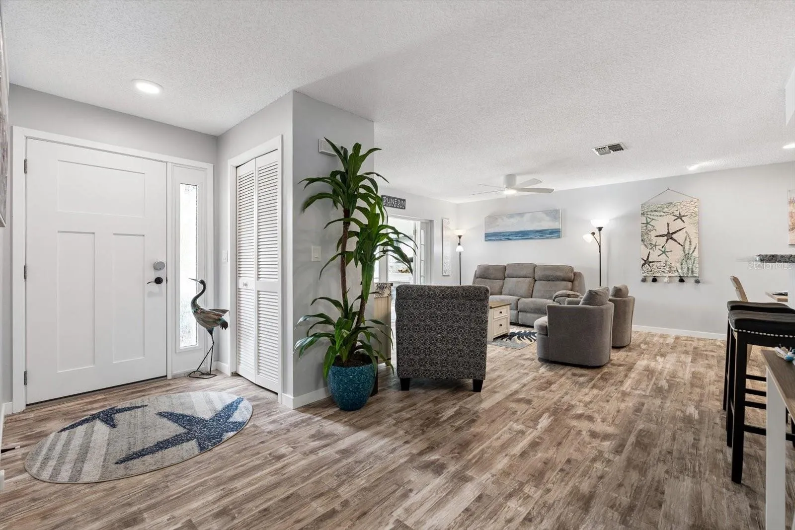 Front entrance leading into open concept living area
